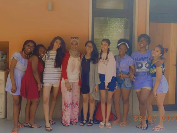 : AKA Maputo Junior School students dancing outside
