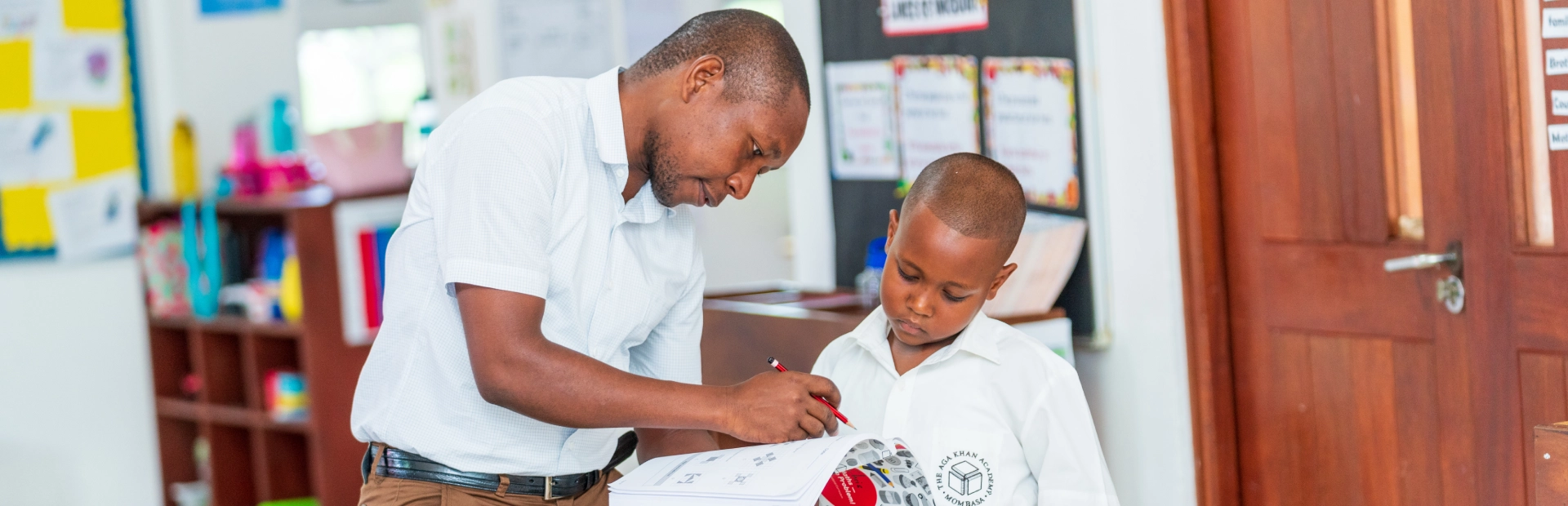 Two Junior School students working together on a project.