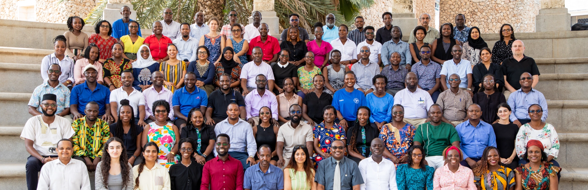 Girls collaborating on a project using a computer.