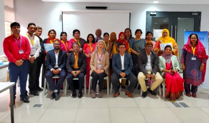 A group of educators pose together after a Professional Development Centre outreach session at the Aga Khan Academy Dhaka.